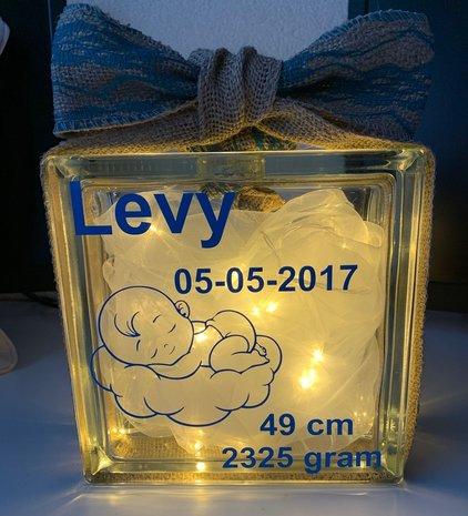 Geboorte glasblok met licht